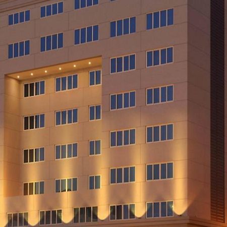 Asiana Hotel Dubai Bagian luar foto The building of the university library