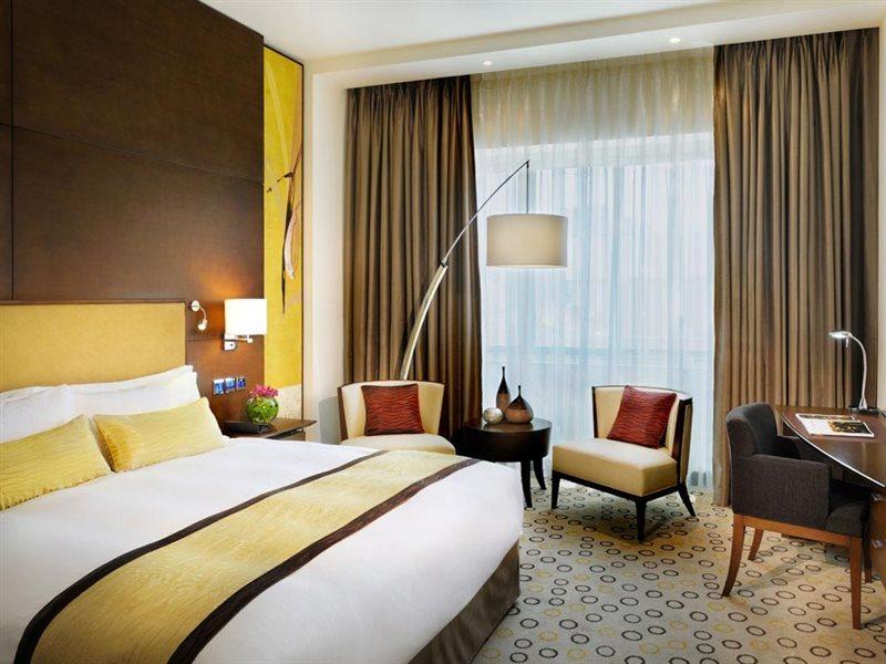 Asiana Hotel Dubai Bagian luar foto A room at the hotel