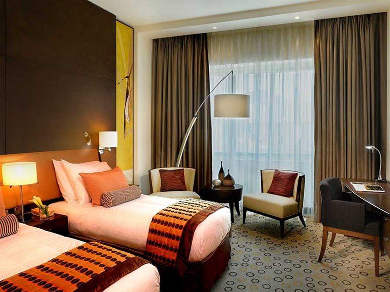 Asiana Hotel Dubai Bagian luar foto A room at the hotel