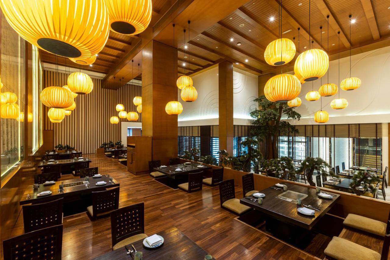 Asiana Hotel Dubai Bagian luar foto The restaurant
