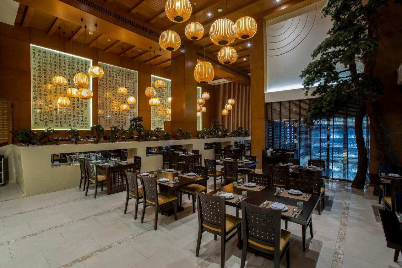 Asiana Hotel Dubai Bagian luar foto The restaurant