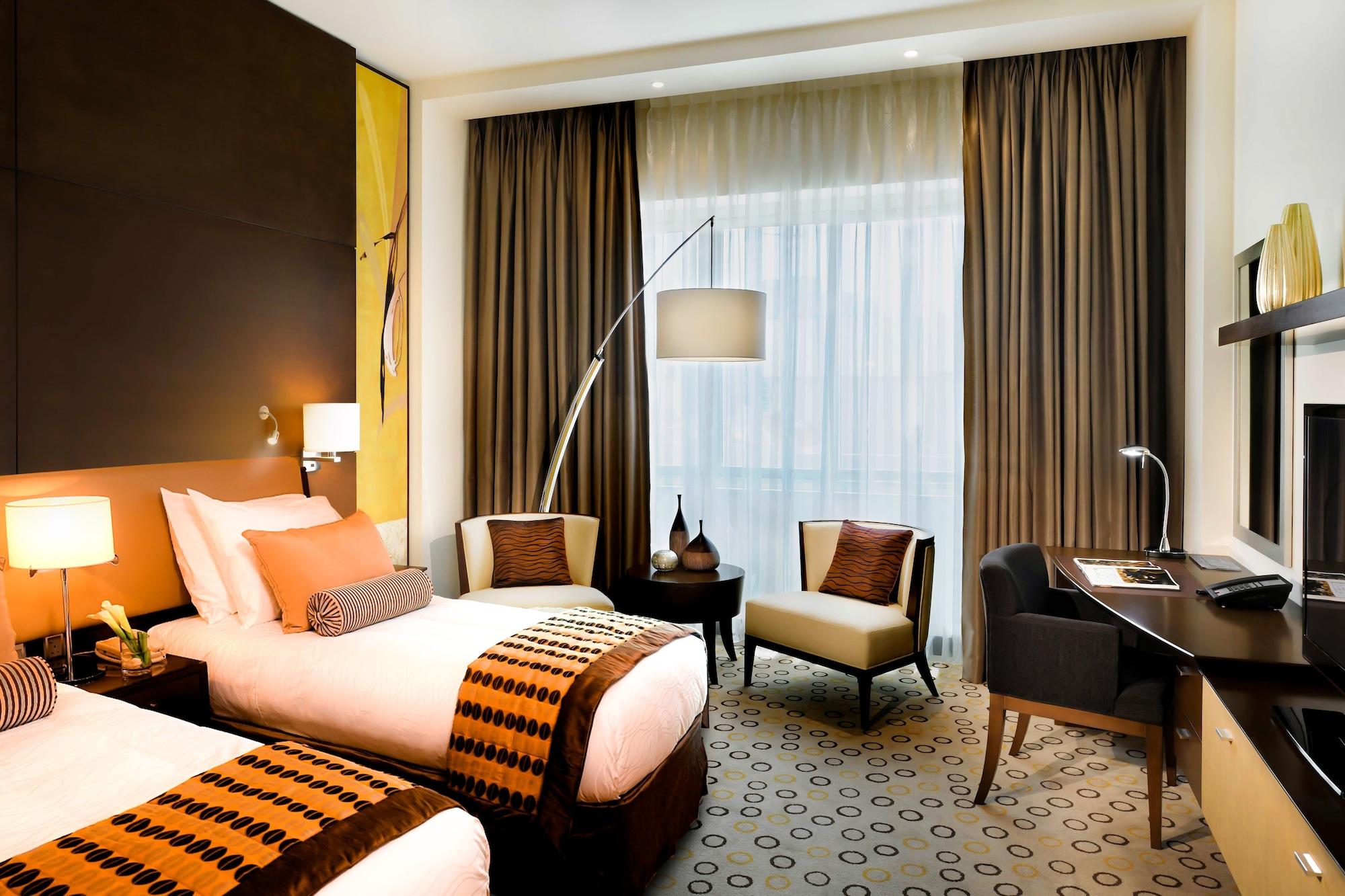 Asiana Hotel Dubai Bagian luar foto A room at the hotel