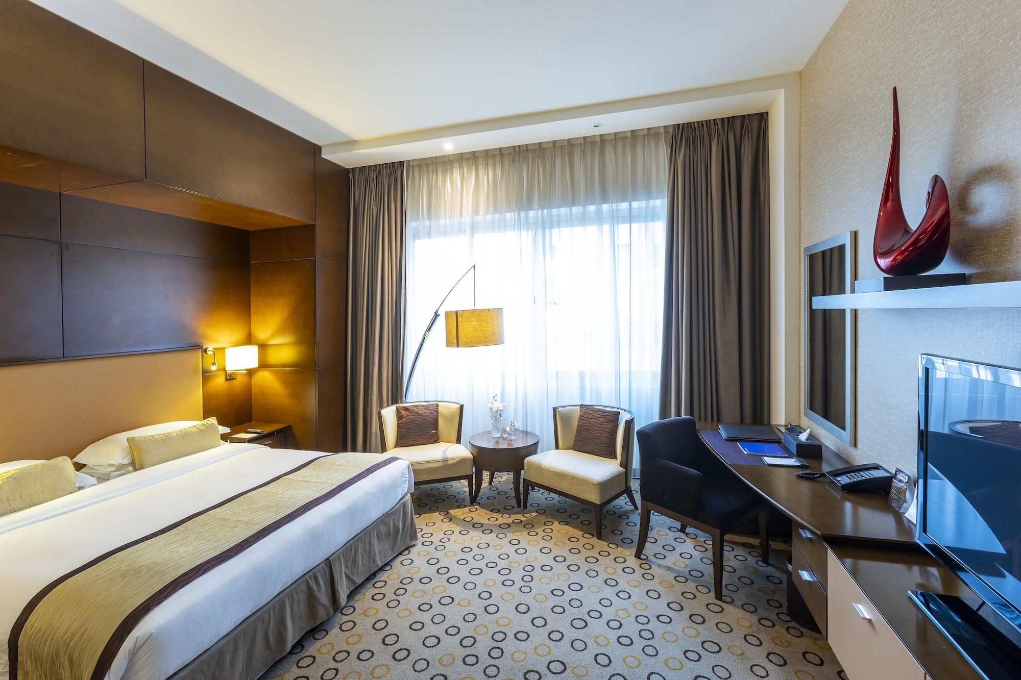 Asiana Hotel Dubai Bagian luar foto A room at the hotel