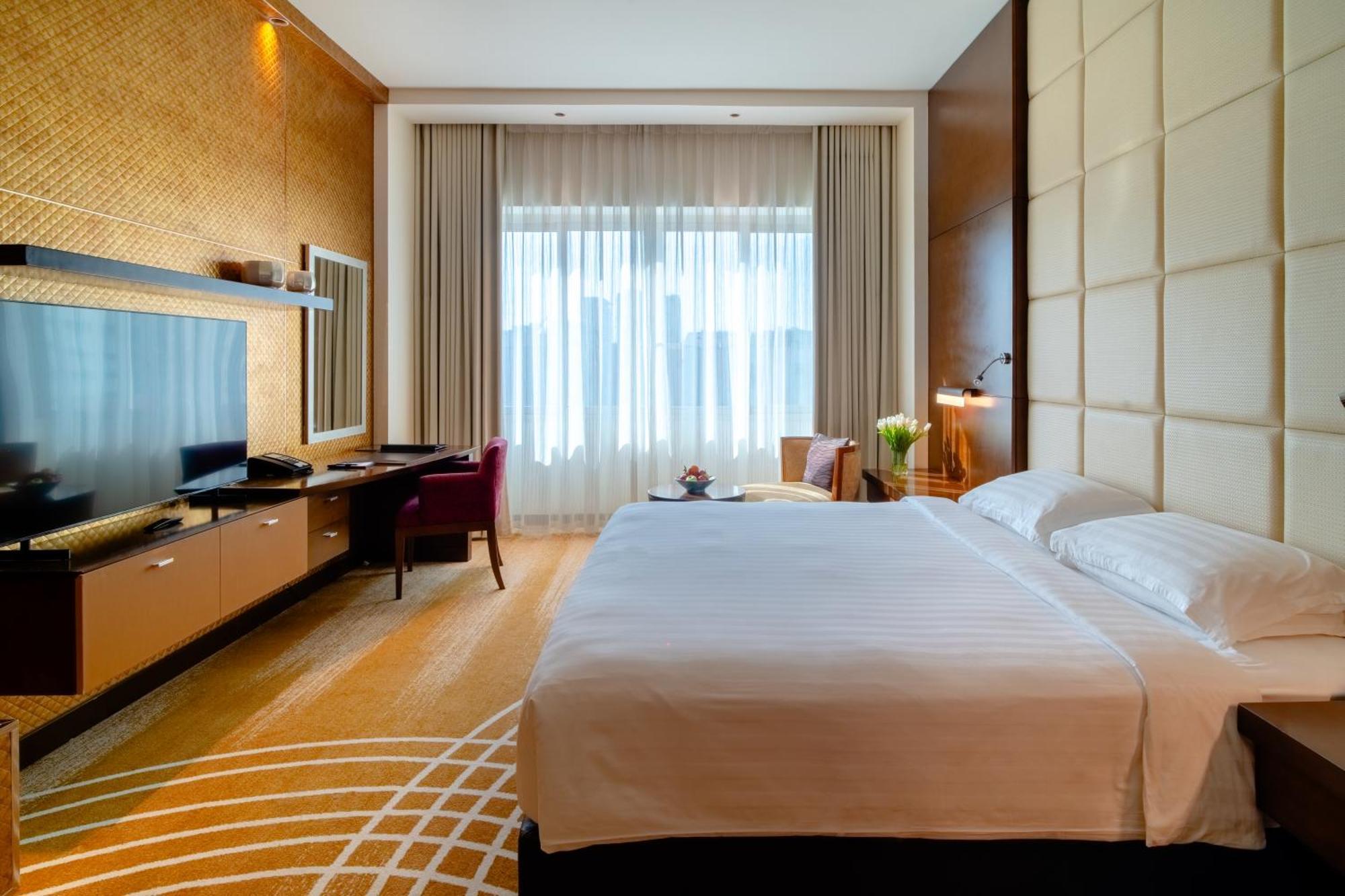 Asiana Hotel Dubai Bagian luar foto A room at the hotel