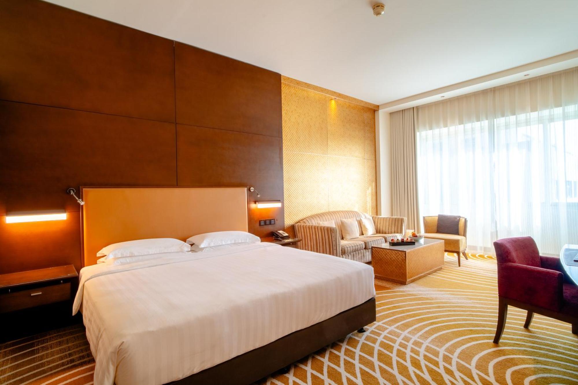 Asiana Hotel Dubai Bagian luar foto A room at the hotel