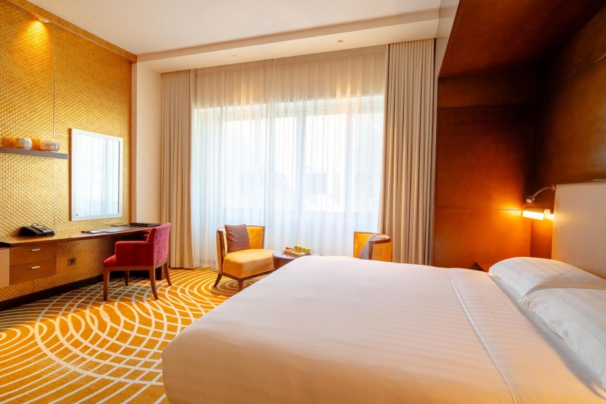 Asiana Hotel Dubai Bagian luar foto A room at the hotel