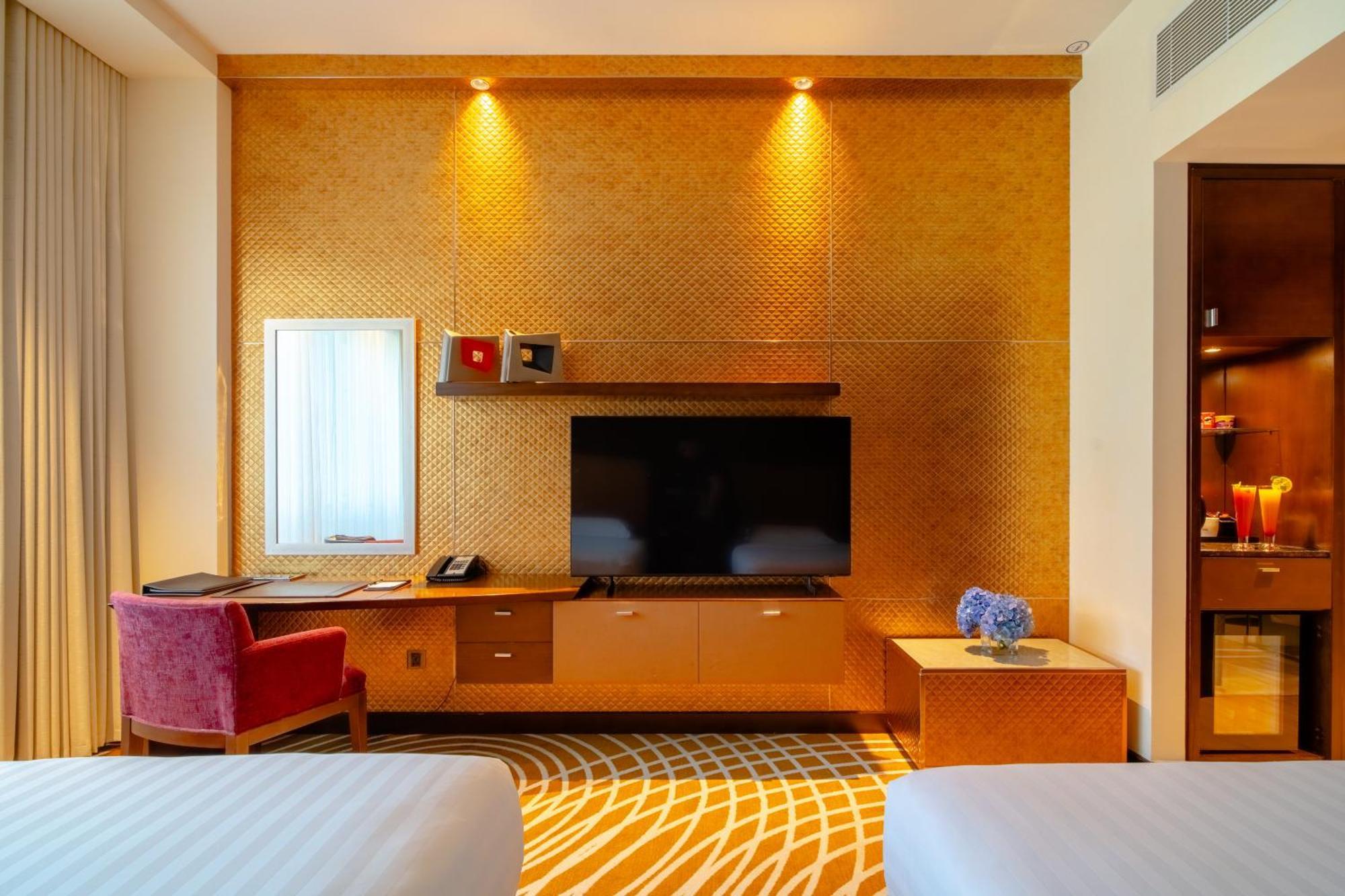 Asiana Hotel Dubai Bagian luar foto A room at the hotel