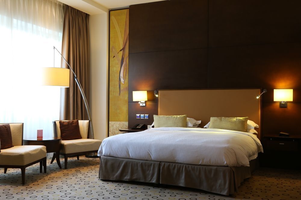 Asiana Hotel Dubai Bagian luar foto A room at the hotel